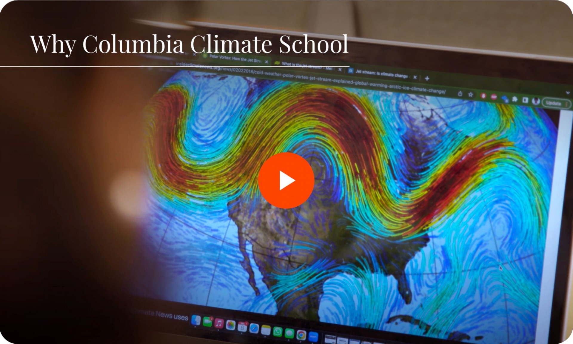 Person looking at a large computer monitor displaying satellite imagery with the text Why Columbia Climate School