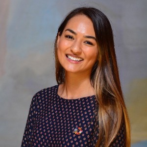 Young woman, named Laurel Zaima, smiling headshot