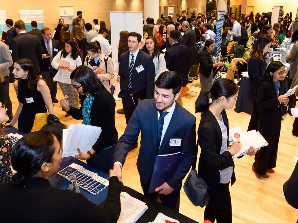 Numerous people at a conference