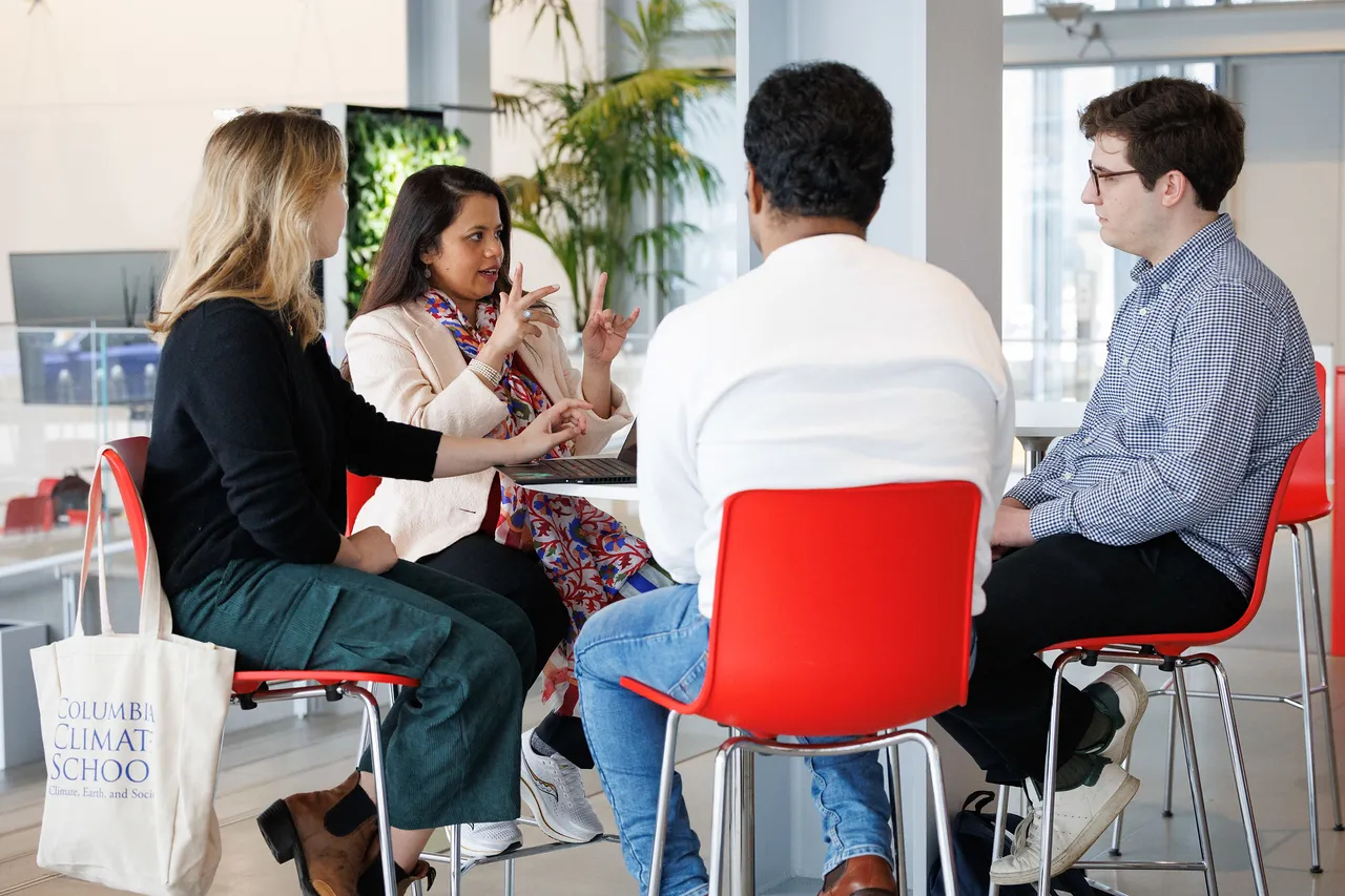 Four people around a table