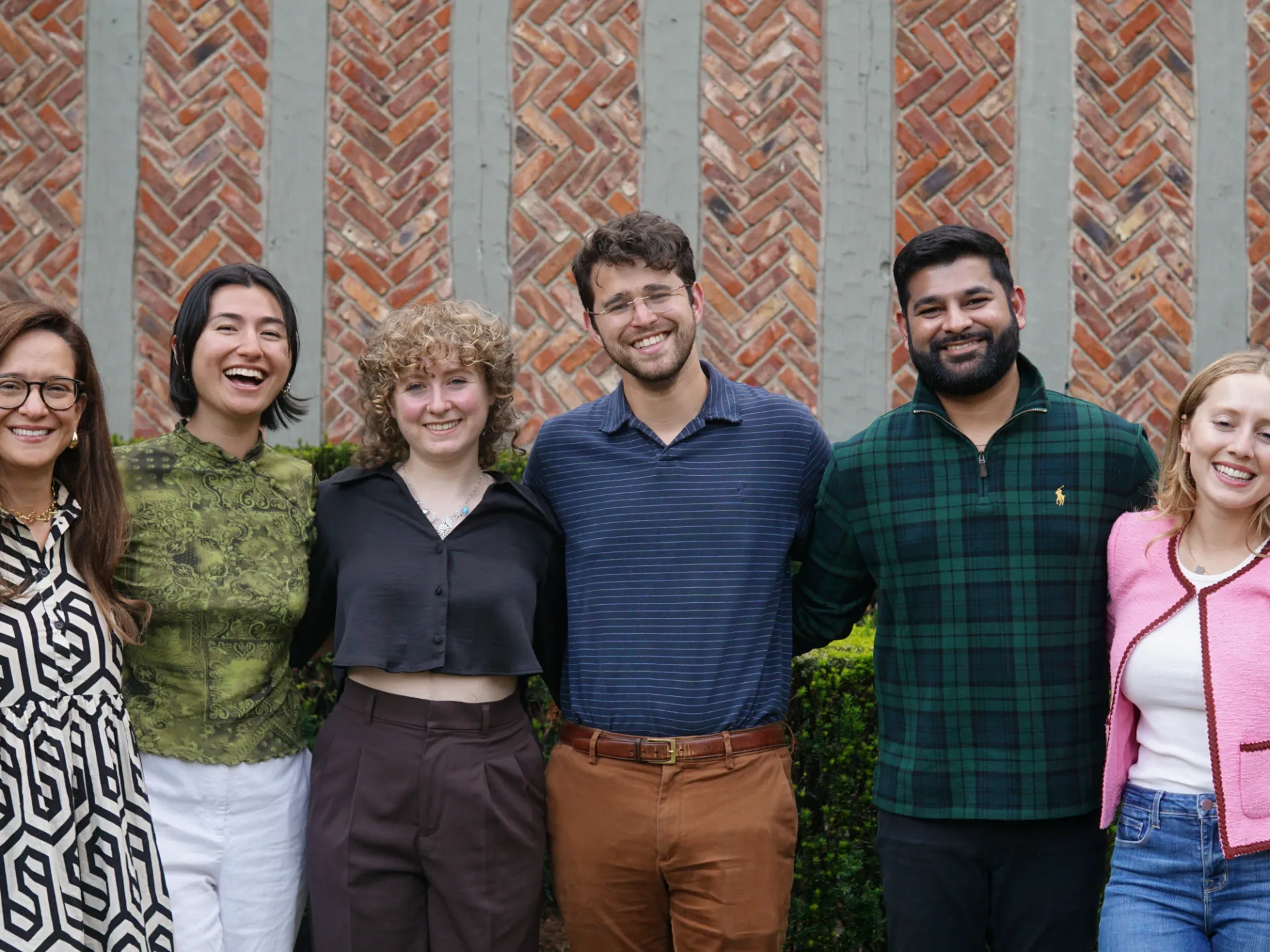 Group of six smiling people