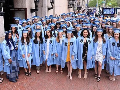 Columbia Climate Schol graduates in caps and gowns on Class Day