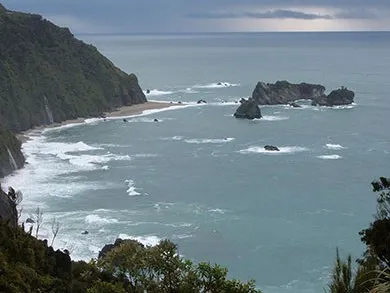 Rocky coastline with water and sky