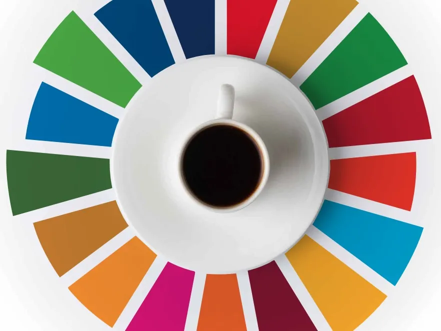 A coffee cup surrounded by colorful bars representing the SDGs.