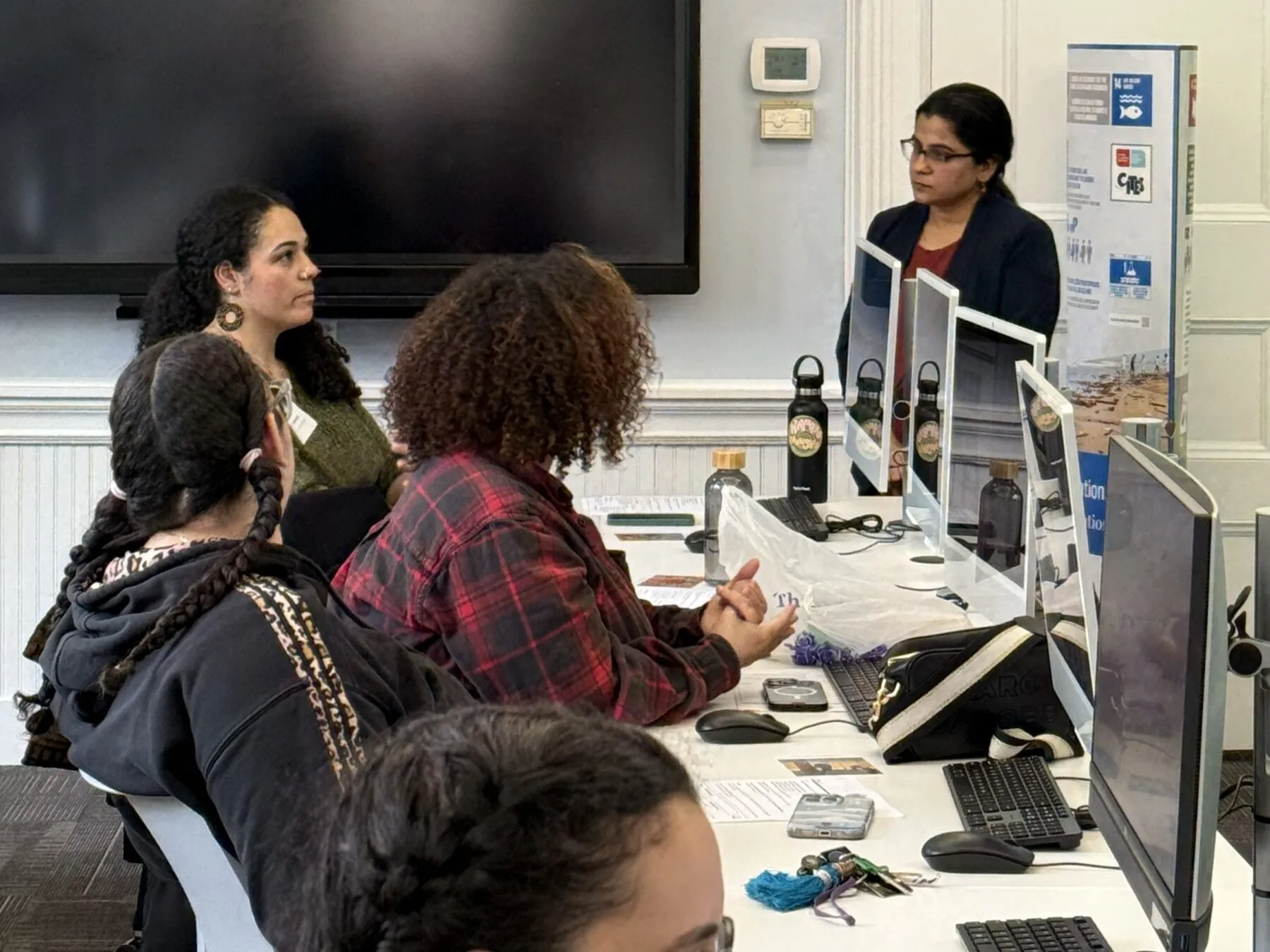 Radhika Iyengar presenting a curriculum to educators